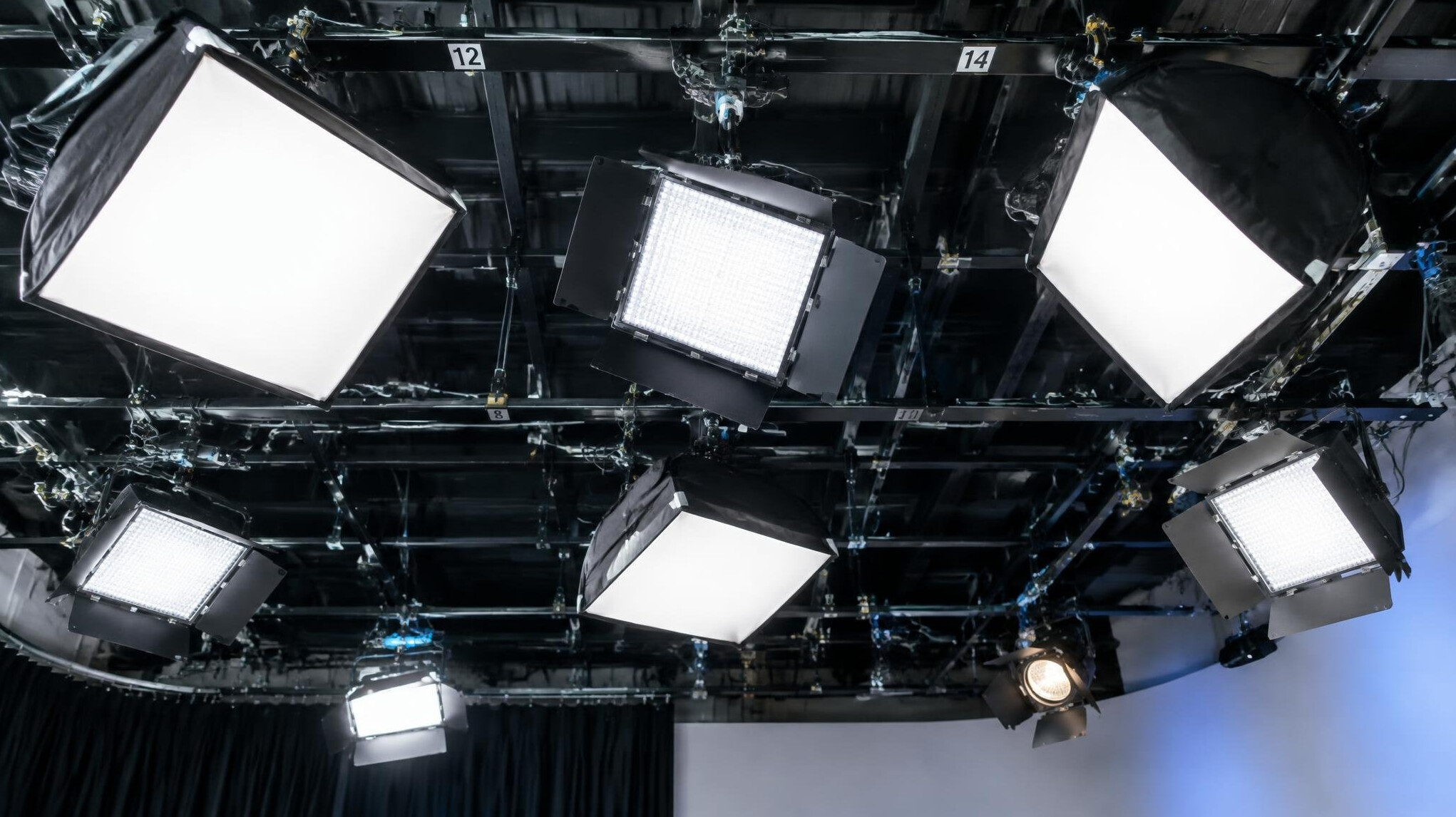Overhead studio lighting rig with multiple softbox lights